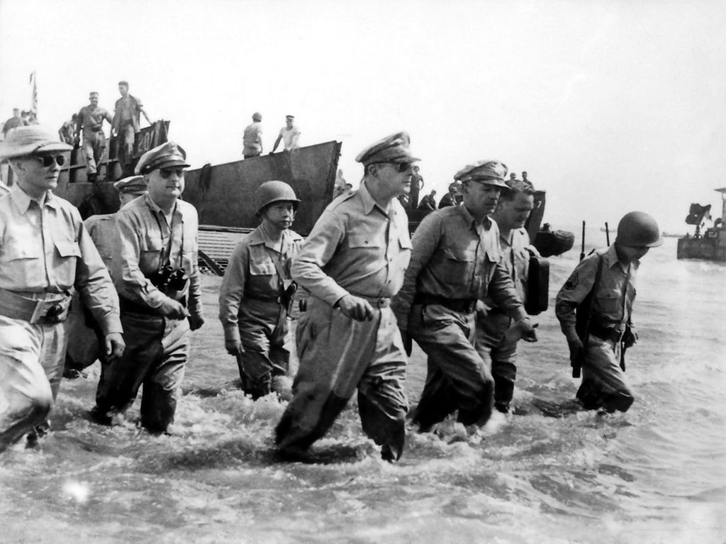 MacArthur, Philippine President Sergio Osmena, Jr, and MacArthur's staff waded ashore on Leyte, October 20th, 1944, fulfilling MacArthur's promise to return to the Phillippines.